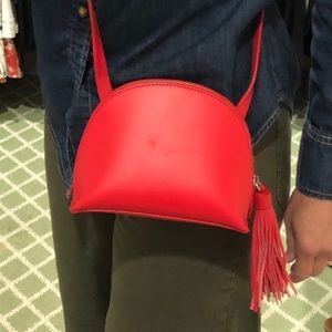 Loeffler Randall  
Vachetta Convertible Cross Body